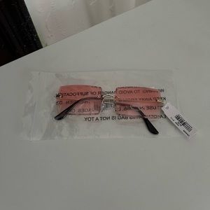 Pink rimless sunglasses